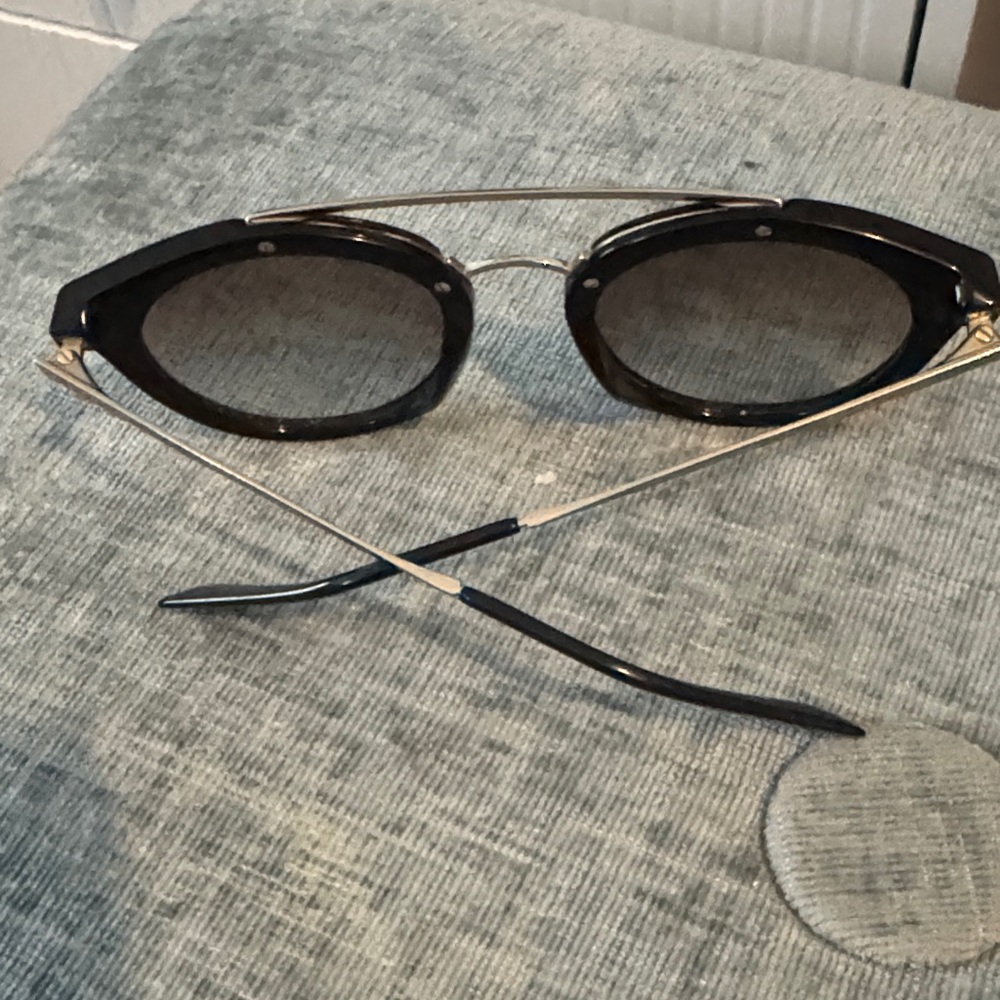Prada Black Round Cat-Eye Sunglasses with Gold Bridge - Picture 3 of 3